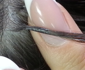 коррекция наращенных волос